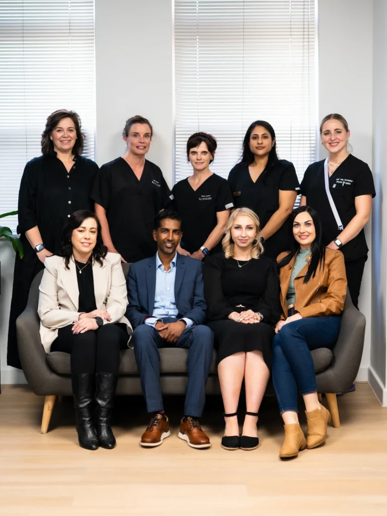 Dr Jaytesh Pillay with his multidisciplinary spine care team including physiotherapists, clinical associates and practice administration staff.