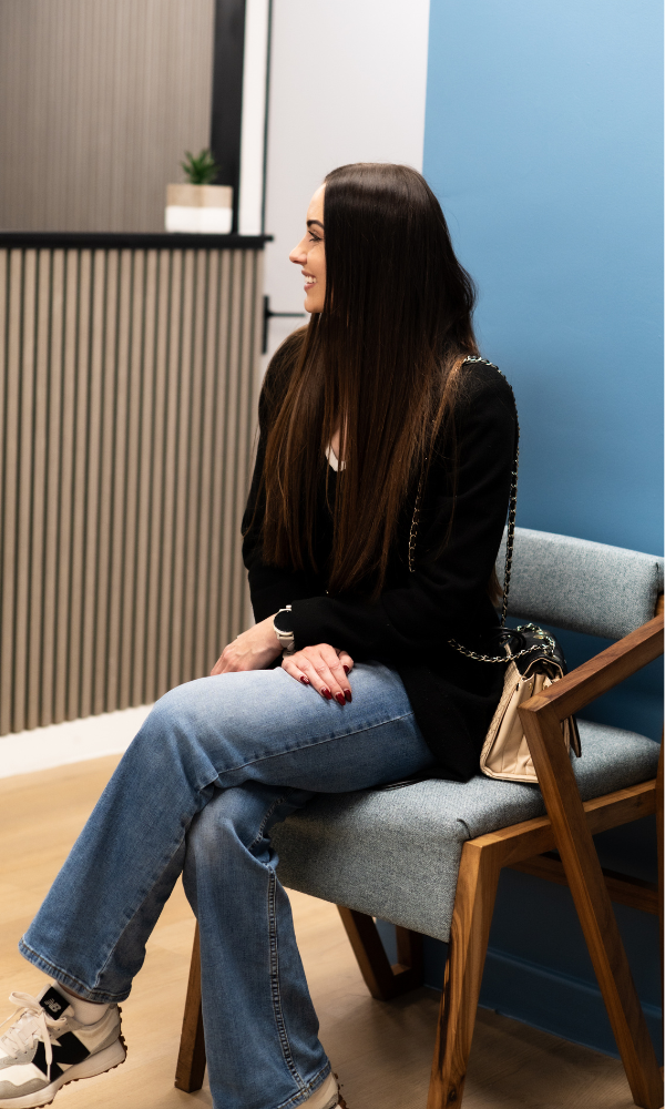 Patient attending a personalised spine consultation with Dr Jaytesh Pillay for an individualised treatment plan