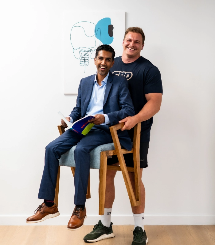 Rayno Nel with Dr Jaytesh Pillay following specialised spinal treatment and successful recovery