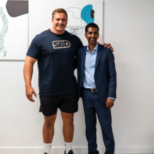 Rayno Nel with Dr Jaytesh Pillay following specialist spinal care